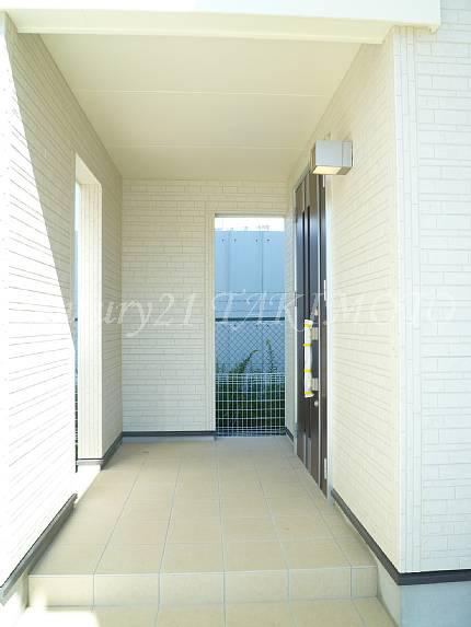 Other. Entrance around is a toy space of strollers and children in the Covered