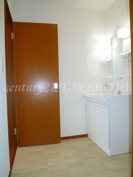 Wash basin, toilet. Washroom has led from the kitchen.