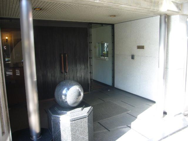 Entrance. Shared entrance to enter the entrance hall