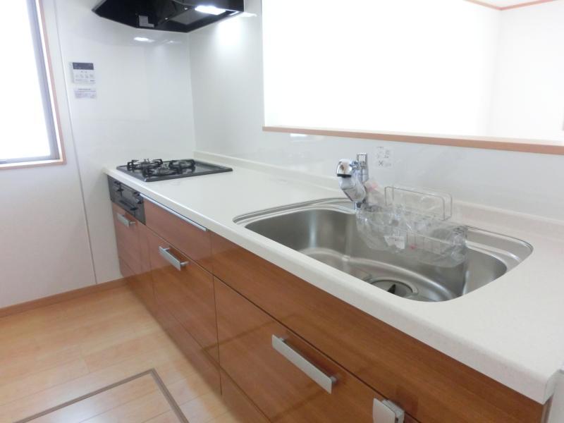 Kitchen. Family smile meet face-to-face kitchen