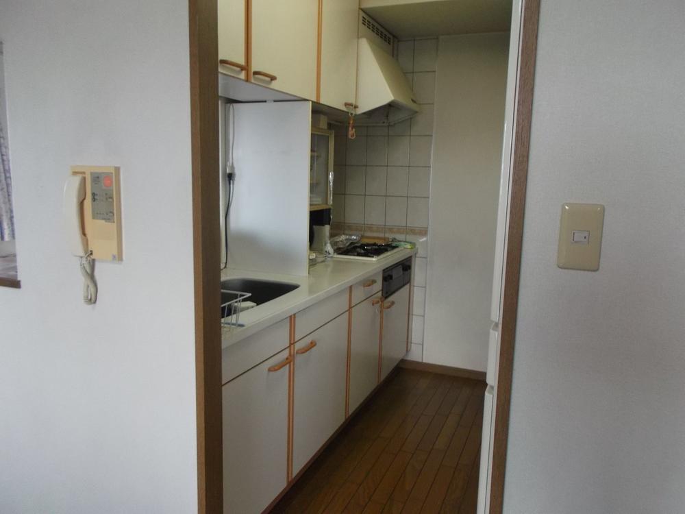 Kitchen. And to isolate the kitchen space and living space, It has become a floor plan of maintaining the privacy.