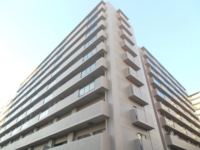 Local appearance photo. The ground is a 10-story apartment