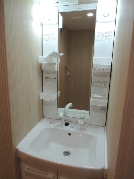 Wash basin, toilet. Shampoo dresser is also a new.