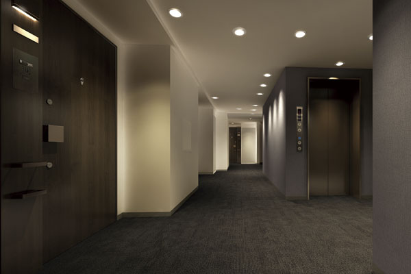 Features of the building.  [Inner hallway] Elegant inner corridor design privacy and crime prevention has been increased, Approach from the elevator hall to the private residence without being exposed to the outside air. And comfortable throughout the year, Dramatizing the life that was full of elegance and comfort (Rendering)