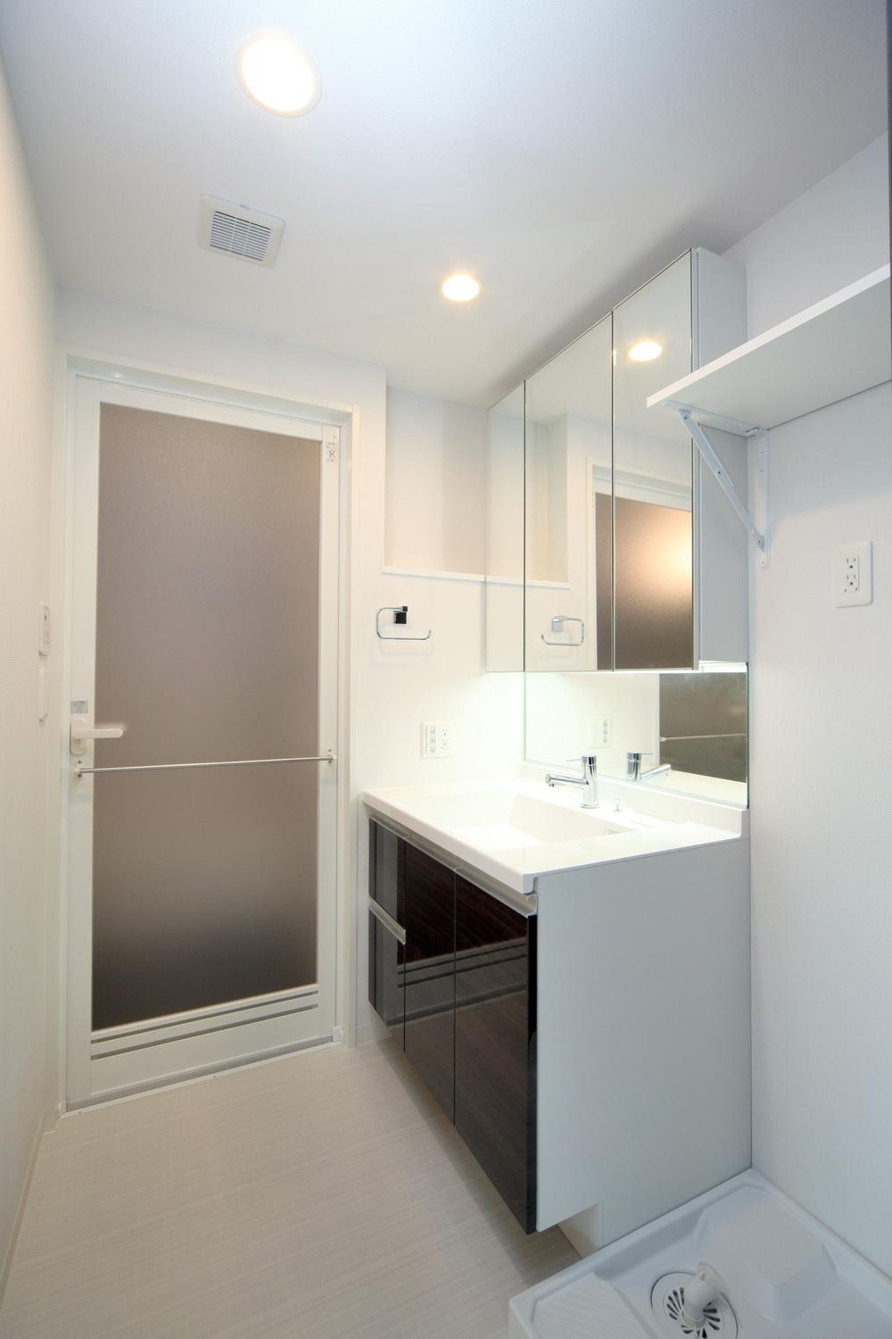 Wash basin, toilet. Completion photos (inverted) same specification