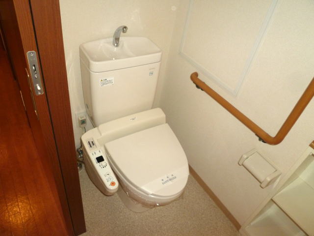 Toilet. Bidet ・ With handrail