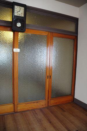 Other Equipment. Showa early glass door, A mud wall house. 