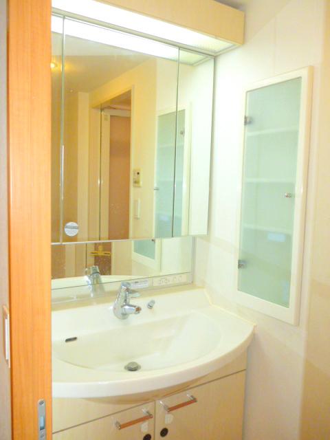 Wash basin, toilet. It is a separate room photo of the same apartment