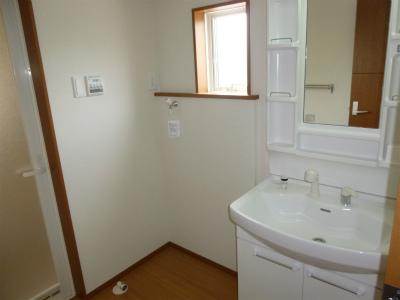 Wash basin, toilet. It is the same type type washroom