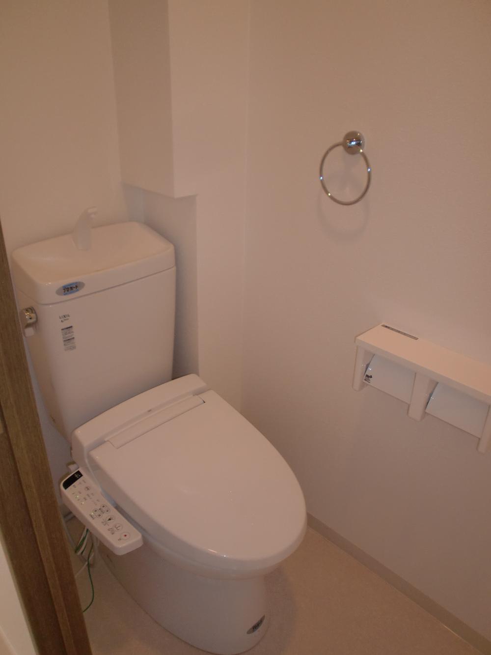 Toilet. Is settled had made in high-function toilet.