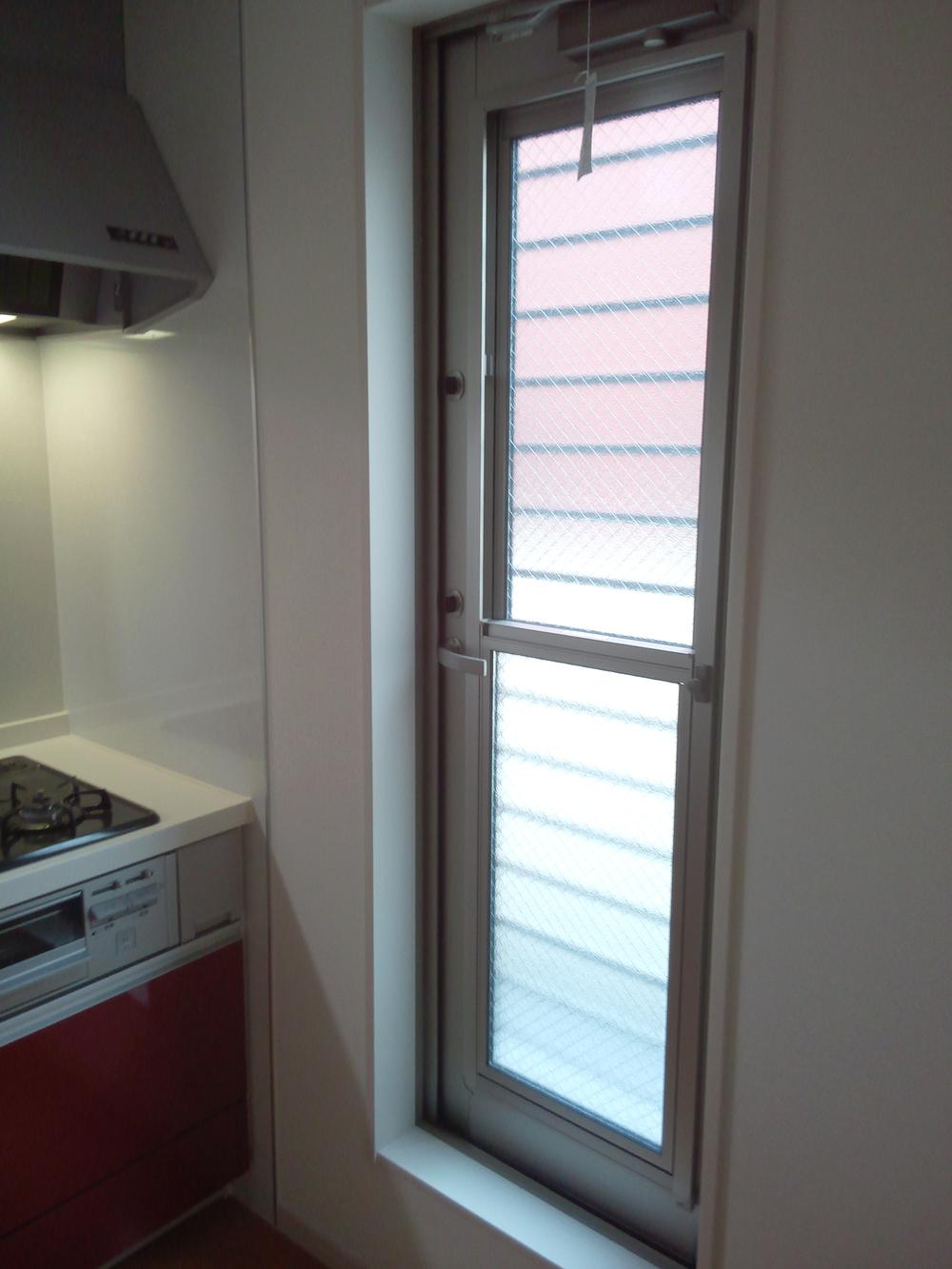 Kitchen. It is convenient and the back door something in the kitchen