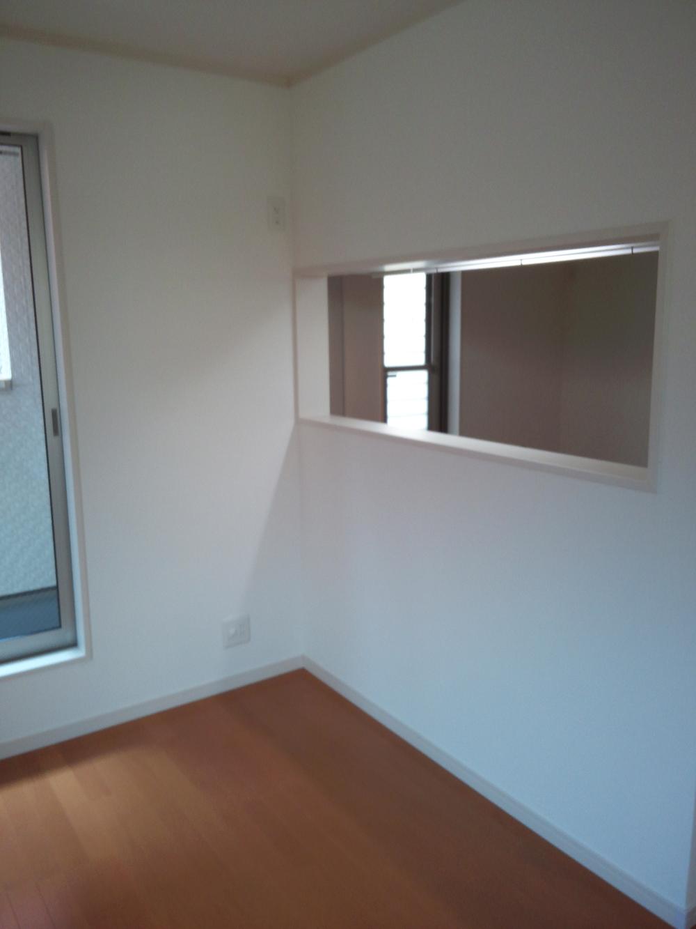 Living. Kitchen visible from the living room