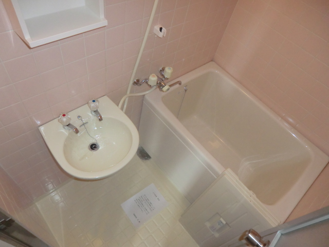 Bath. It is a basin with bathroom. 