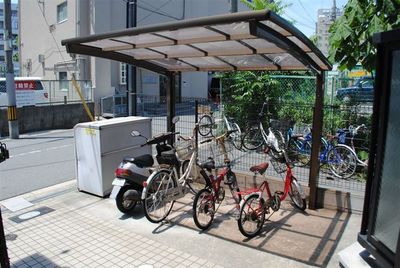 Other. Bicycle parking lot is equipped with roof