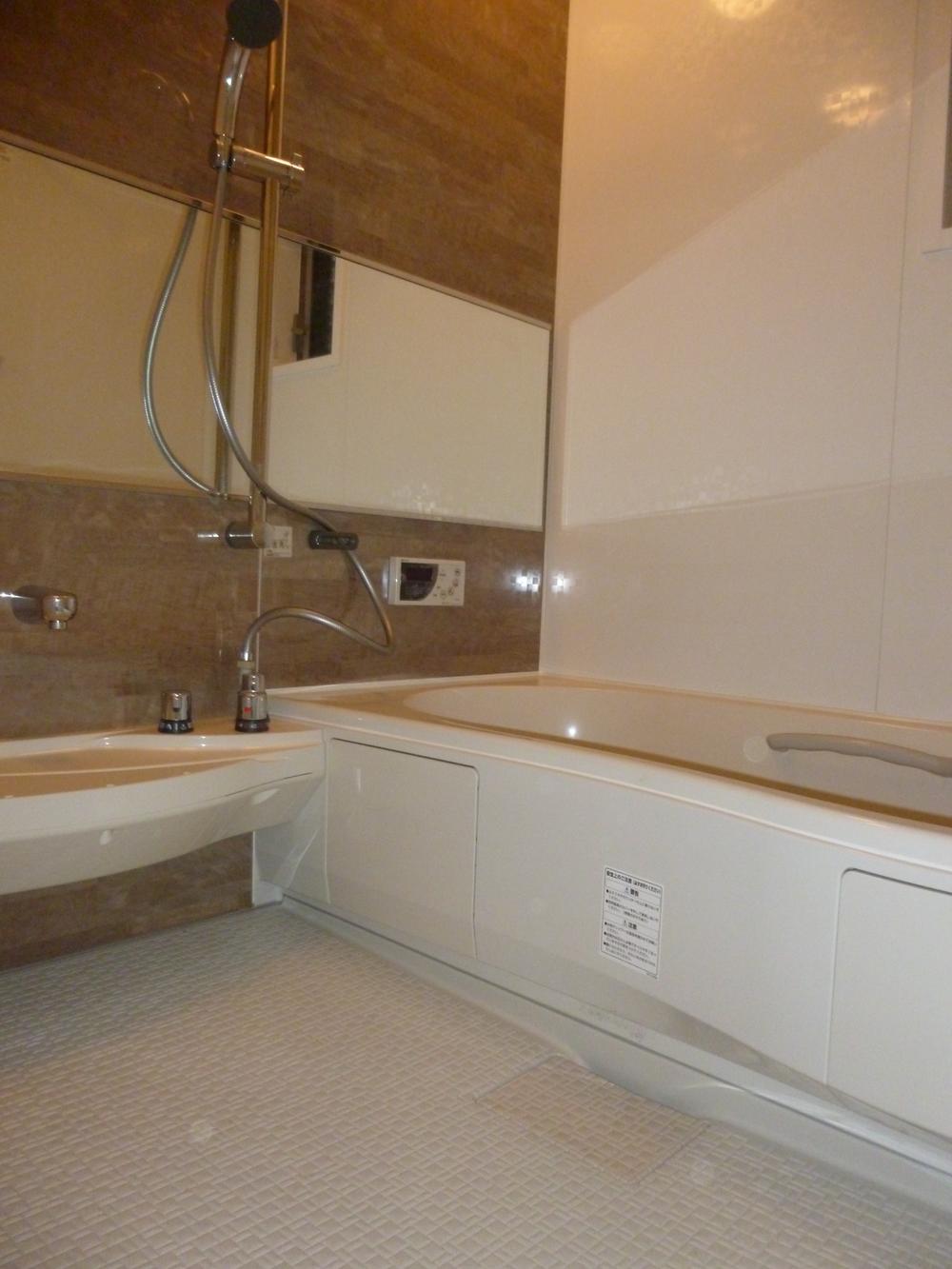 Bathroom. Bathroom also has been enhanced is large storage space