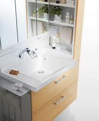 Wash basin, toilet. Side with storage in the spacious washstand.