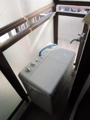 Balcony. This washing machine Storage. 