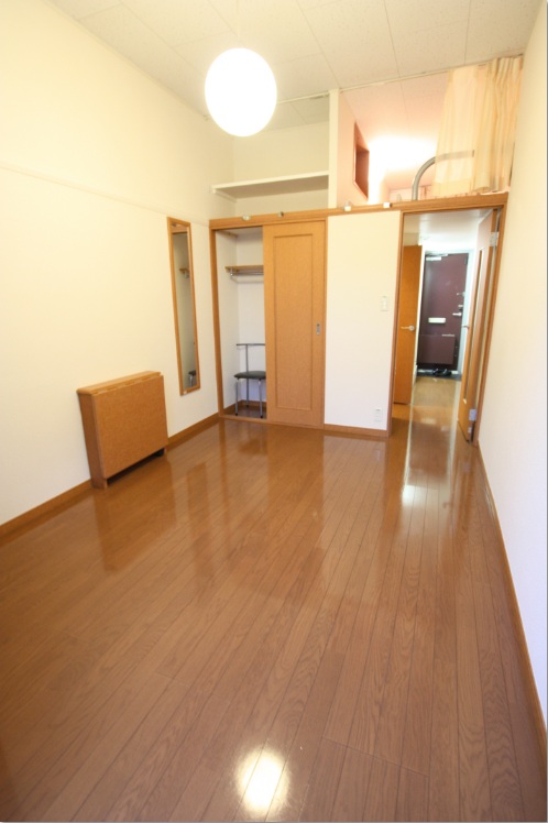 Living and room. First floor flooring, The second floor above a carpet-covered