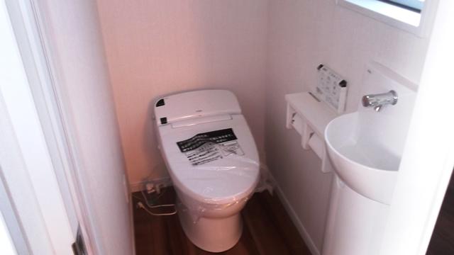 Toilet. Tankless toilet with hand washing