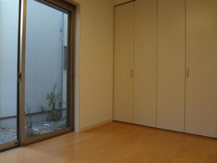 Non-living room. Big sweep window of a large closet is characterized by