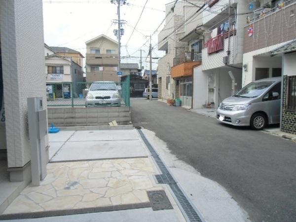 Local photos, including front road. Residence of convenient parking with space