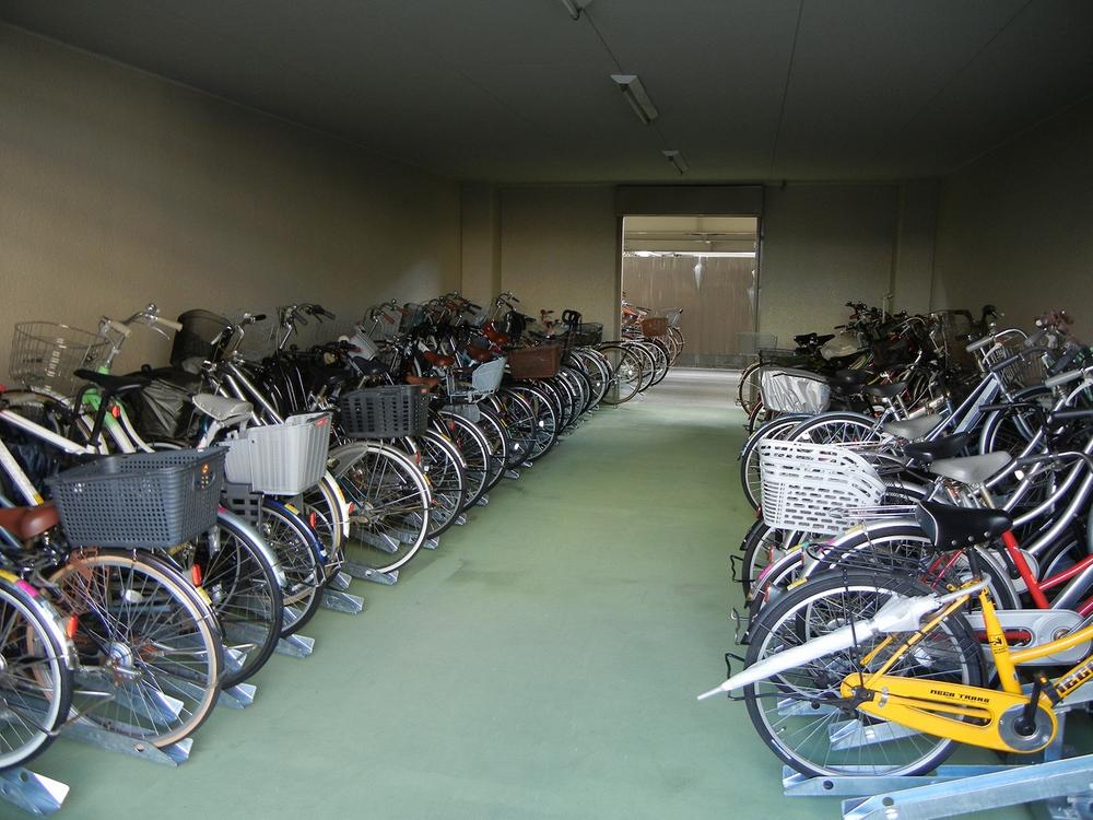 Parking lot. Neatly organized that it has been bicycle storage.