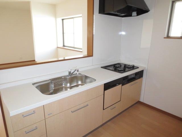 Kitchen. It is with dish washing dryer.