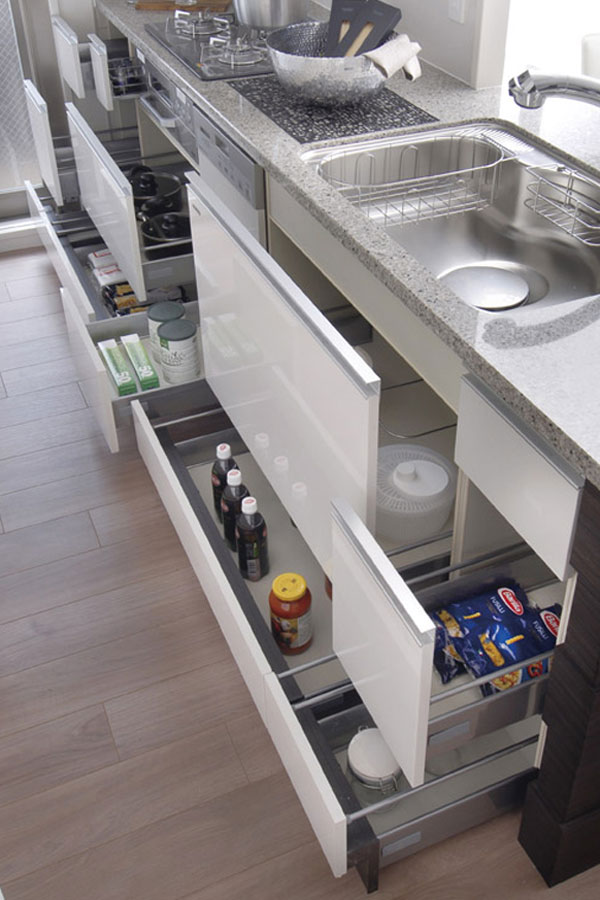 Kitchen.  [Slide cabinet ・ Width wood storage] Frying pan or pot, Slide cabinet kitchen supplies can be put away. Also provided baseboards storage that make effective use of space (same specifications)