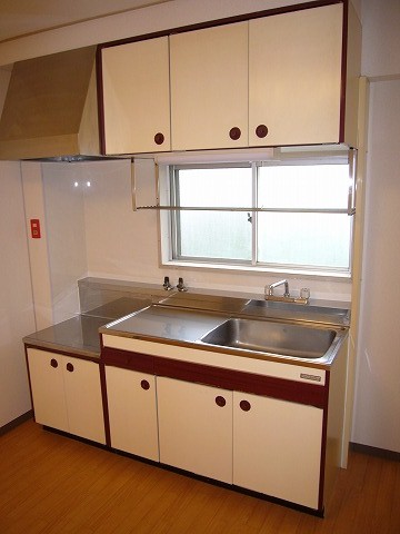 Kitchen. Gas stove installation type of kitchen It is a small window is happy