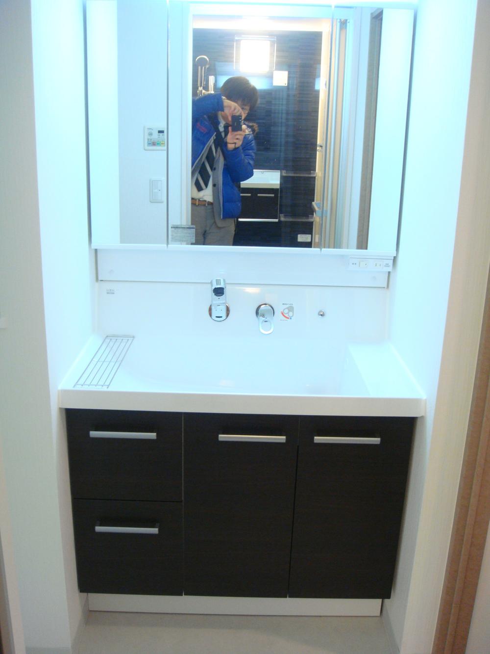 Wash basin, toilet. I had made the vanity.