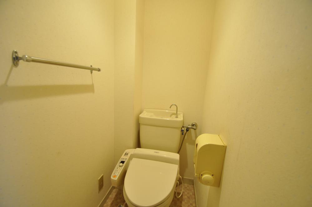 Toilet. Also space spacious toilet