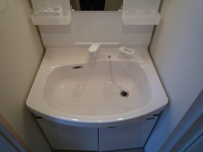 Washroom. Wash basin with shampoo dresser