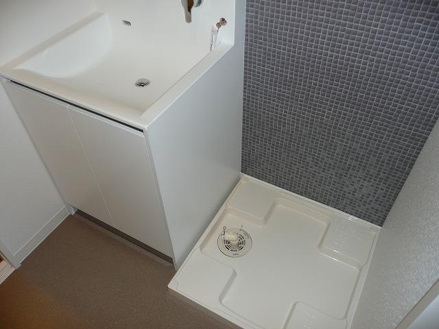 Wash basin, toilet. Stylish basin dressing room of tile land