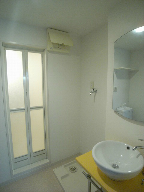 Washroom. It is very fashionable wash basin, such as designer. 