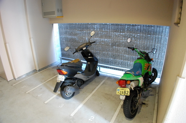 Entrance. Motorcycle Parking