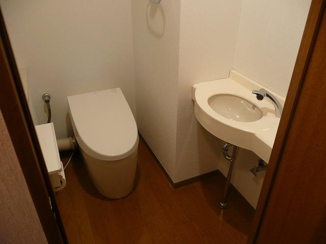 Toilet. High-performance toilet. Lid is free when a person approaches