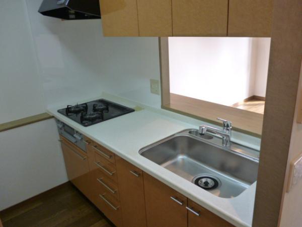 Kitchen. Glass top is a stove had made.