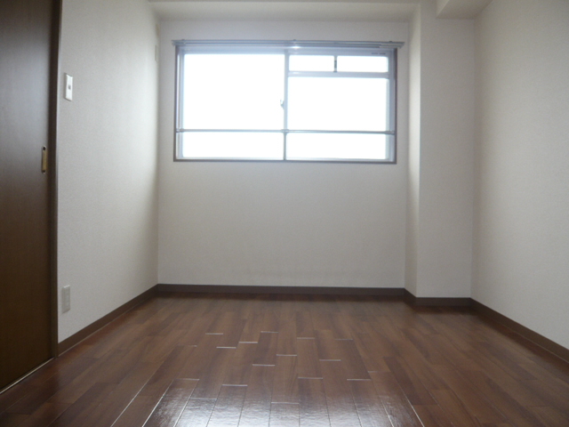 Other room space. There is also a window open a Western-style