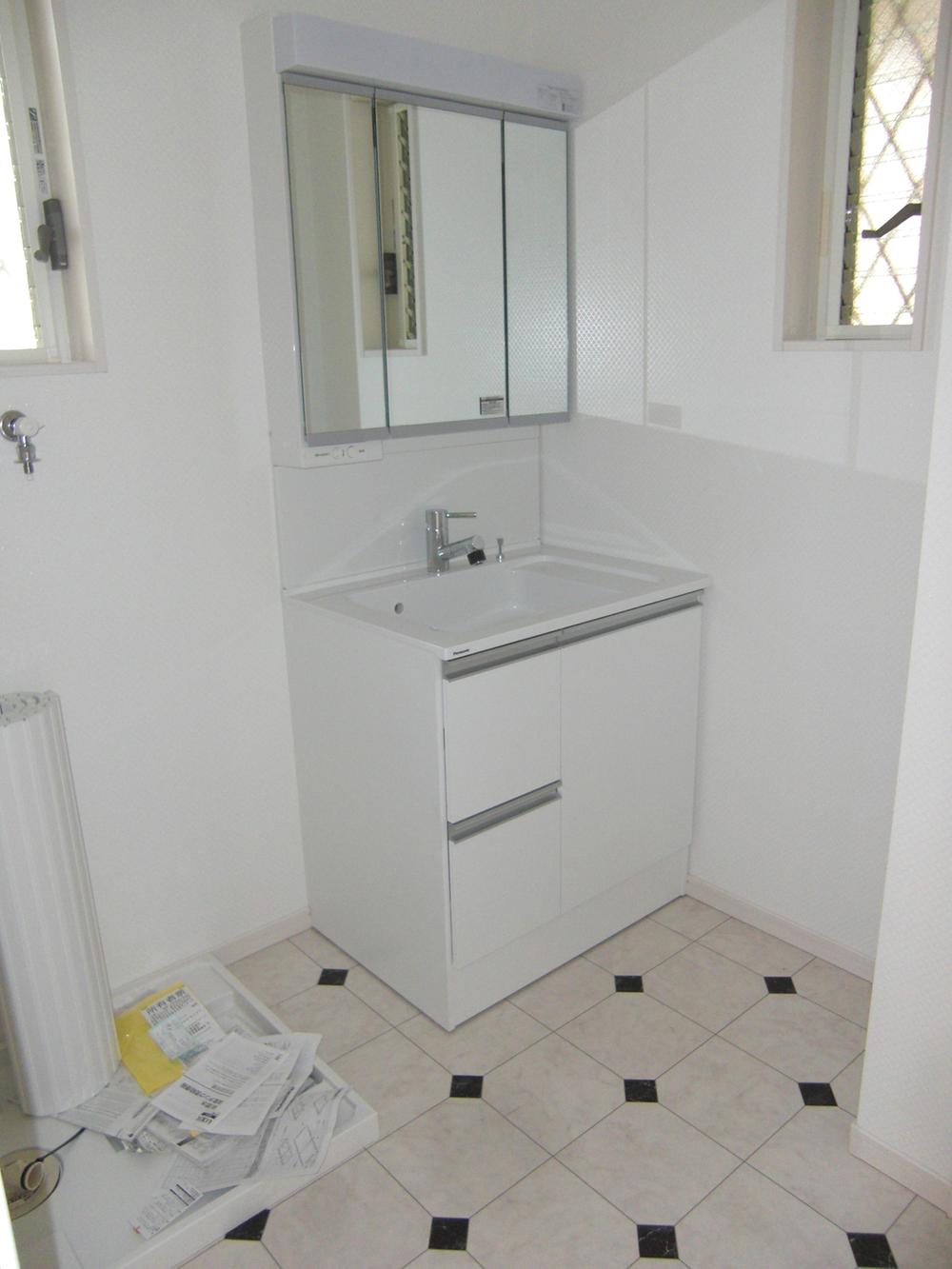 Wash basin, toilet. ( C Building) same specification )