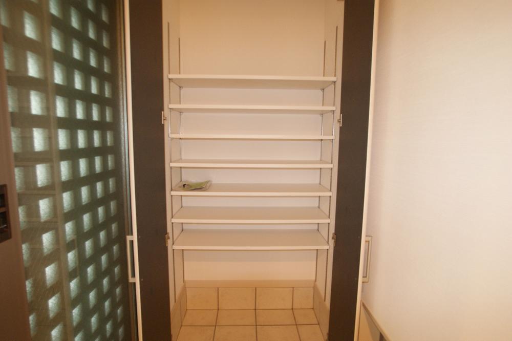 Entrance. Entrance next to the shoes cloak