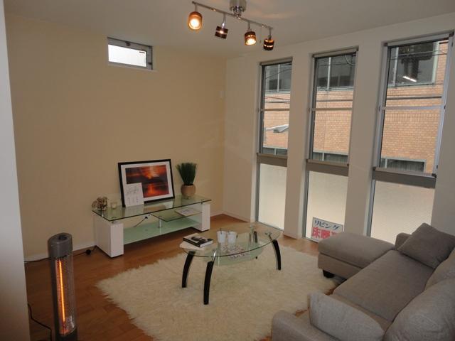 Same specifications photos (living). Very bright living room with a lot of large windows