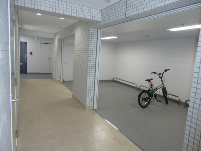 Entrance. Indoor bicycle parking lot