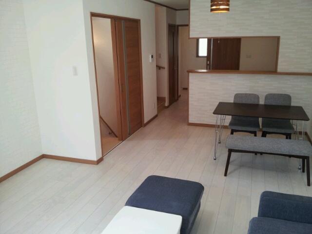 Living. There is a sense of open living-dining