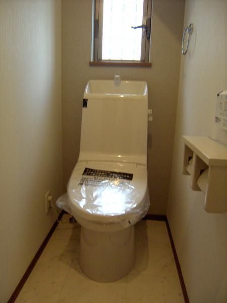 Toilet. Convenient toilet with two places