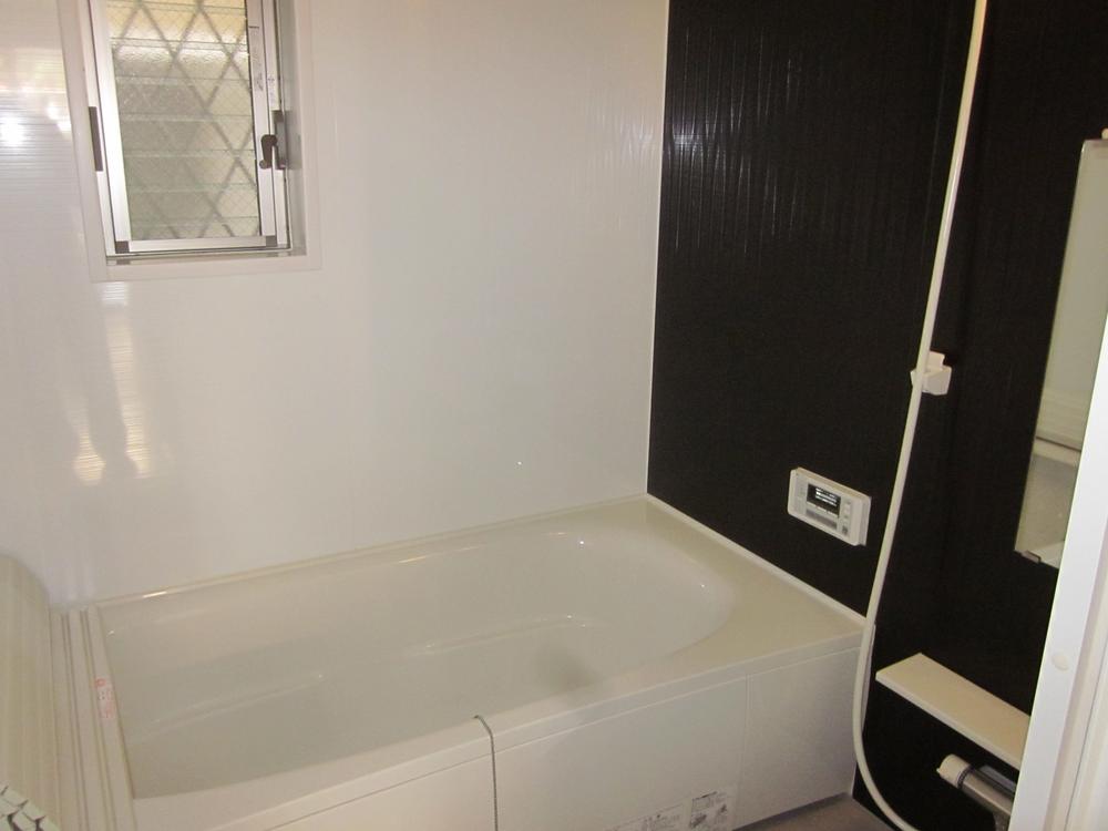 Bathroom. There is a window in the bathroom