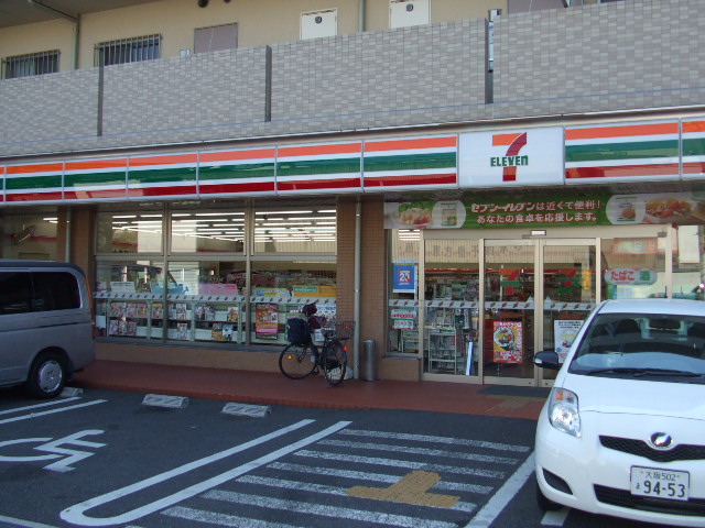 Convenience store. Eleven Osaka Tamade Station store up to (convenience store) 548m