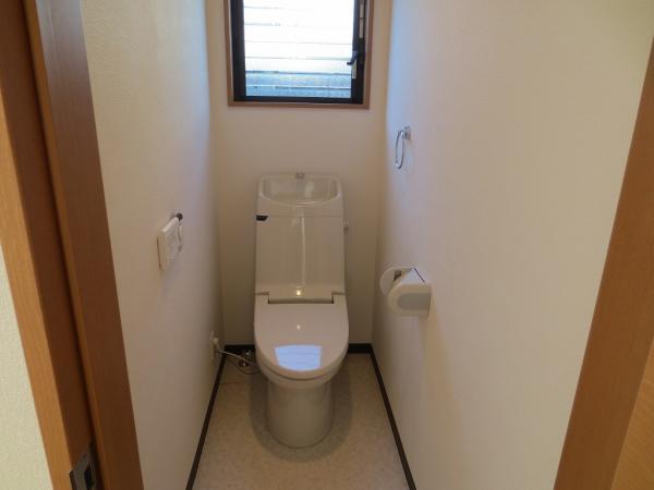 Toilet. First floor toilet. It is bright and there is a window