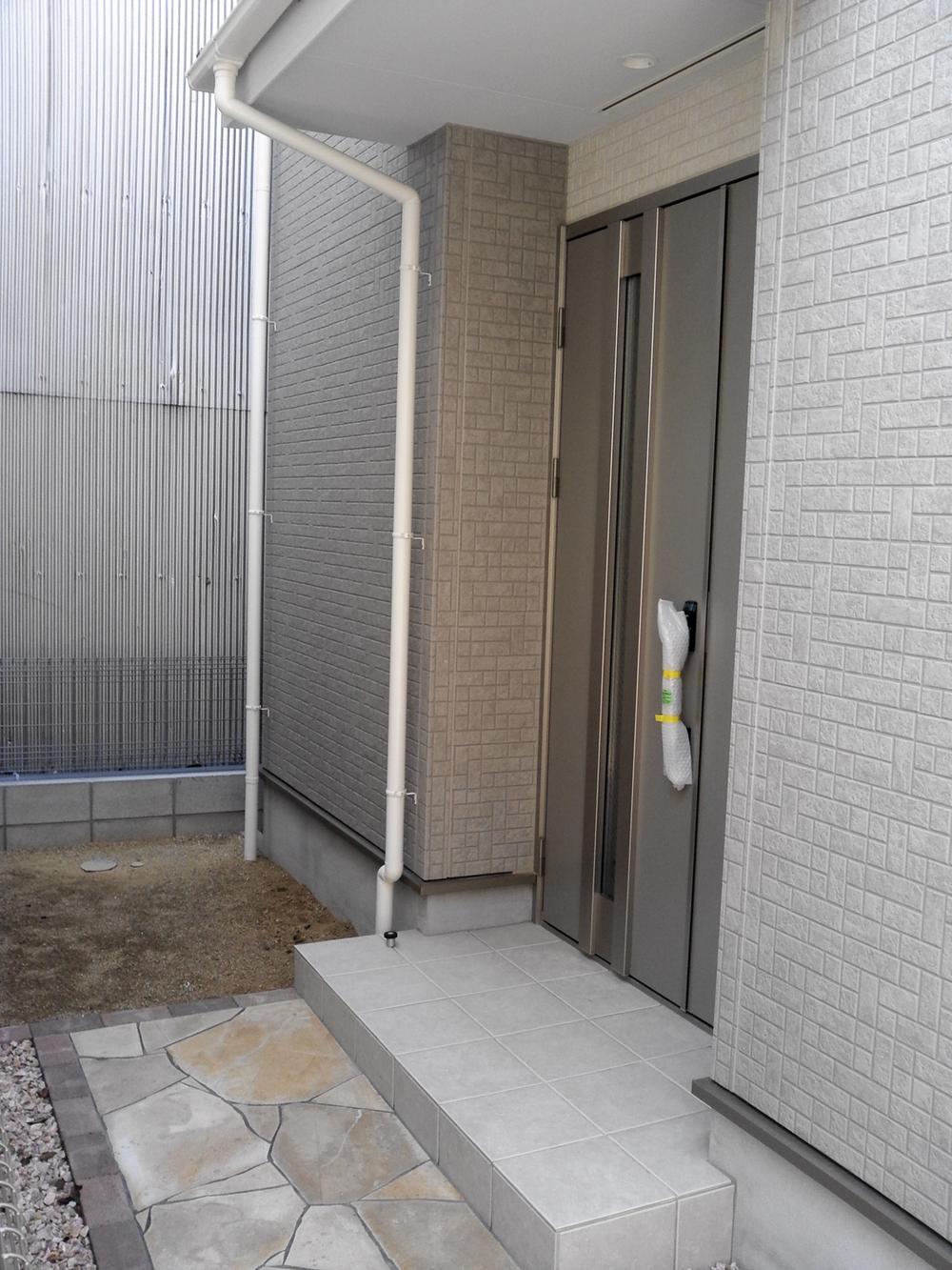 Entrance. There is a small garden is next to the porch