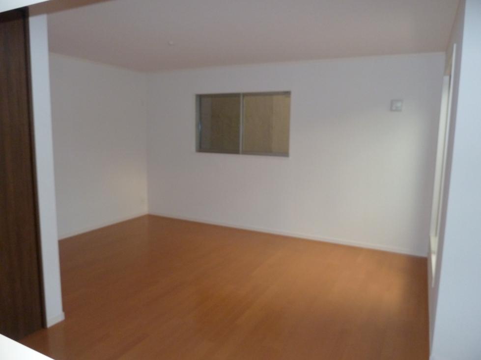 Living. It is living from the kitchen.