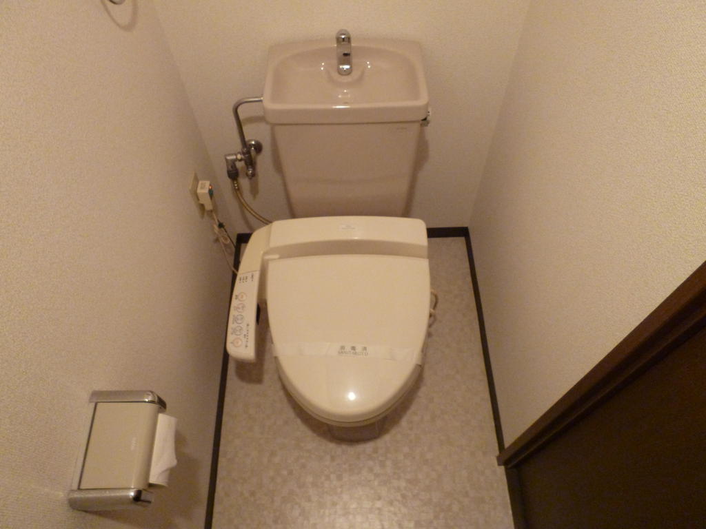 Toilet. Washlet is with